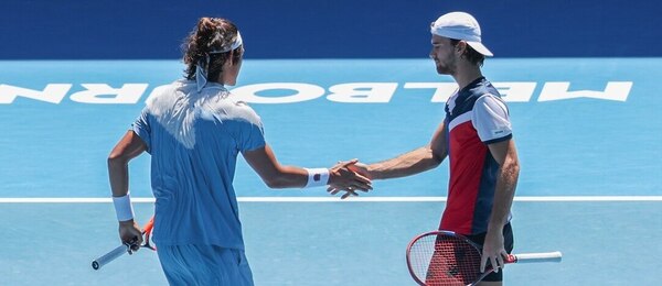 Tenis, grandslam Australian Open, Tomáš Macháč a Zhizhen Zhang během čtyřhry