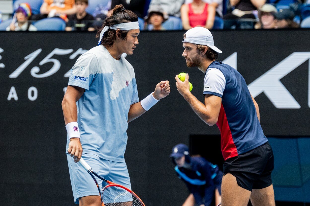 Tenis, ATP, Tomáš Macháč a Zhizhen Zhang během utkání čtyřhry na Australian Open